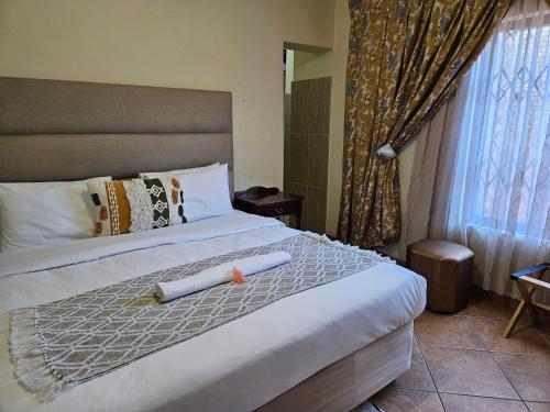 Katil atau katil-katil dalam bilik di AMM Guesthouse