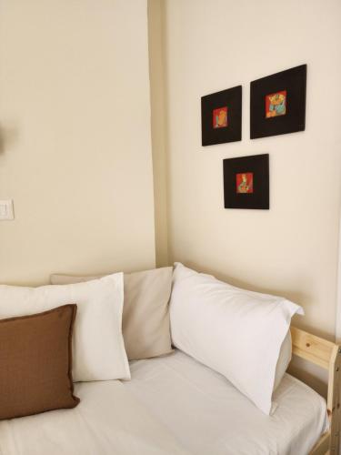 Postel nebo postele na pokoji v ubytování Dhami Apartment