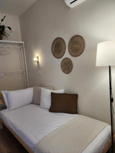 Postel nebo postele na pokoji v ubytování Dhami Apartment