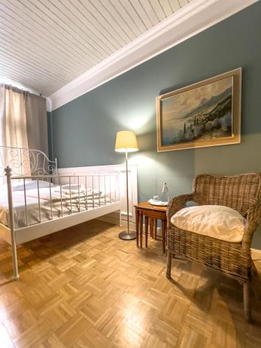 Ένα ή περισσότερα κρεβάτια σε δωμάτιο στο Hotel-Maison Am Olivaer Platz