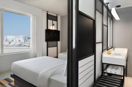 Aloft Muscatにあるベッド