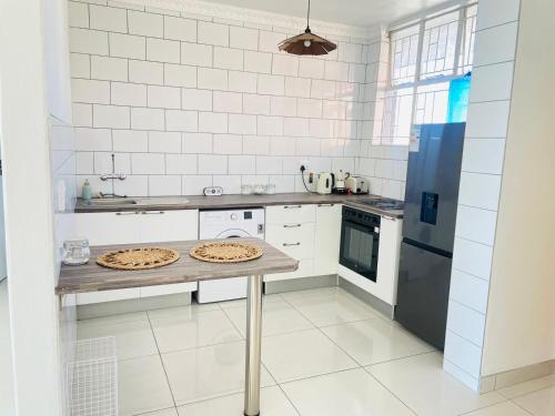 Photo de la galerie de l'établissement Villa Saarchi Apartments, à Windhoek