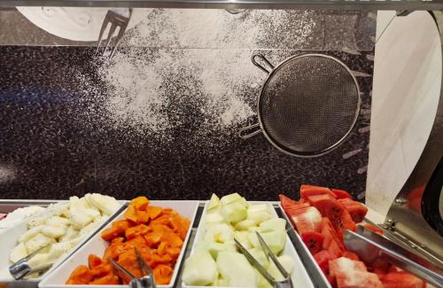 a bunch of different types of vegetables on a counter at Royal Regency Palace Hotel in Rio de Janeiro