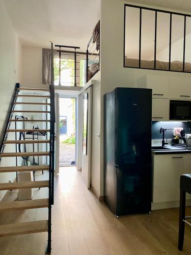 Cuisine ou kitchenette dans l'établissement Appartement indép cosy avec jardin