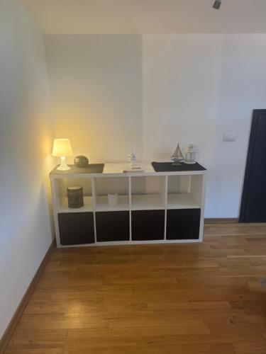 a white cabinet with a sink in a room at Casa nel verde di Casal Palocco Roma in Casal Palocco