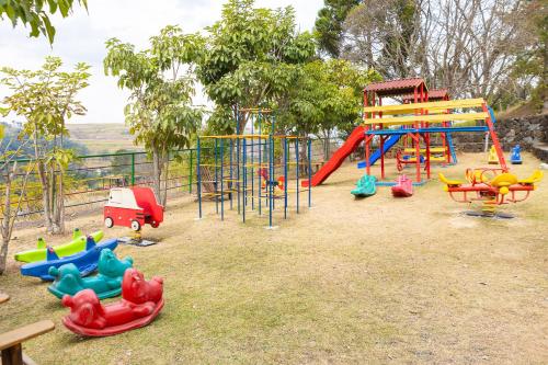 a playground with many different types of play equipment at Hotel Golden Park All Inclusive Poços de Caldas By Nacional Inn in Poços de Caldas