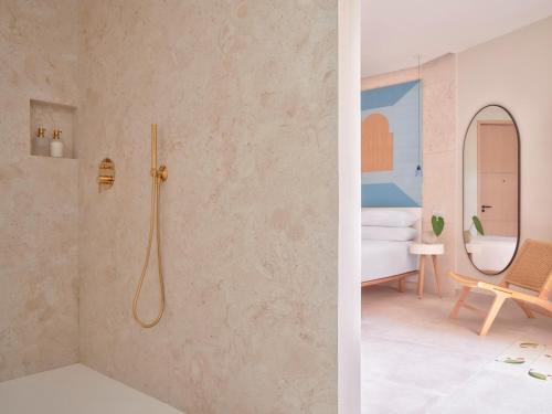 Ванная комната в Kimpton Las Mercedes by IHG