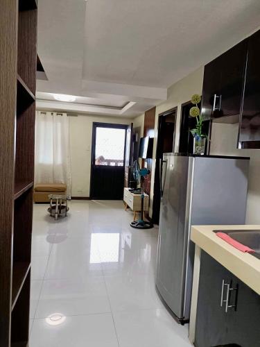 Η κουζίνα ή μικρή κουζίνα στο Ecowest Condo beside SM Mall