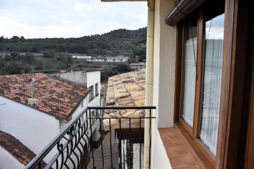 a balcony of a building with a view at Casa Rural Nuri de Rei A y B in Todolella