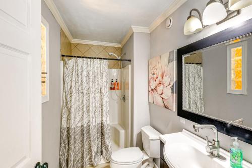 a bathroom with a toilet and a sink and a shower at Delta Junction Retreat with Northern Lights Cabin! in Delta Junction