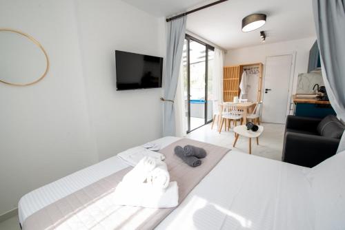 Grand Relax Suitesにあるテレビまたはエンターテインメントセンター