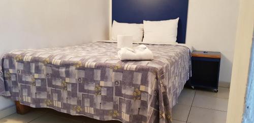 Postel nebo postele na pokoji v ubytování Hotel Vagabundo Expo Guadalajara
