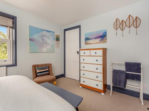 Una cama o camas en una habitación de Achomraich