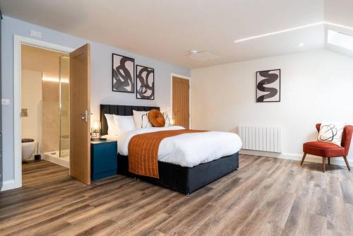 En eller flere senge i et værelse på Majestic - Superior 2 Bedroom 9