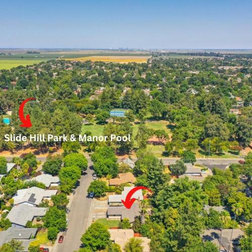 an aerial view of a park and manor pool at Family-Friendly Getaway Near Slide Hill Park home in Davis