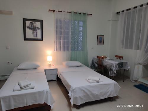 Ένα ή περισσότερα κρεβάτια σε δωμάτιο στο Just 4 you apartment