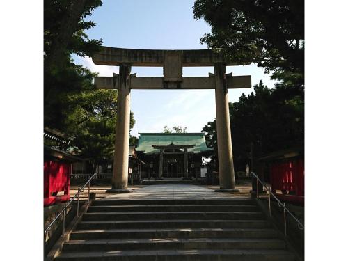a torii gate at a shrine in a park at Asuka Hotel - Vacation STAY 59970v in Karatsu