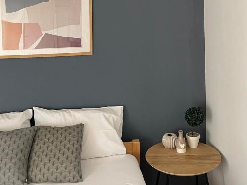 Postel nebo postele na pokoji v ubytování Comfy Studio