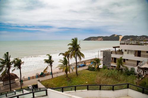 a view of the beach from the balcony of a hotel at Kings Flat - Apartamentos com conforto beira mar in Natal