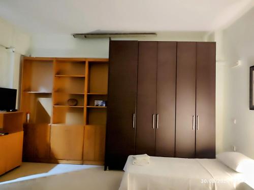 Ένα ή περισσότερα κρεβάτια σε δωμάτιο στο Just 4 you apartment