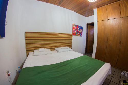 Postel nebo postele na pokoji v ubytování Cosmopolitan Hostel