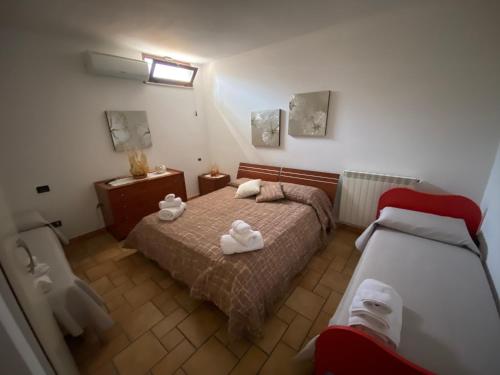A bed or beds in a room at Villa Grisì
