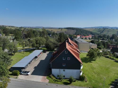 an overhead view of a large house with a garage at Traumharz in Sankt Andreasberg