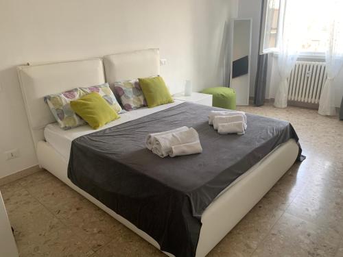 Postel nebo postele na pokoji v ubytování Residenza Piso 23
