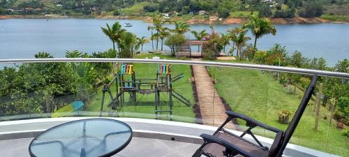 a balcony with a view of a playground at Jordan Hotel Boutique in Guatapé