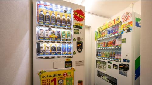a store with a vending machine with soda bottles at JR-East Hotel Mets Fukushima in Fukushima