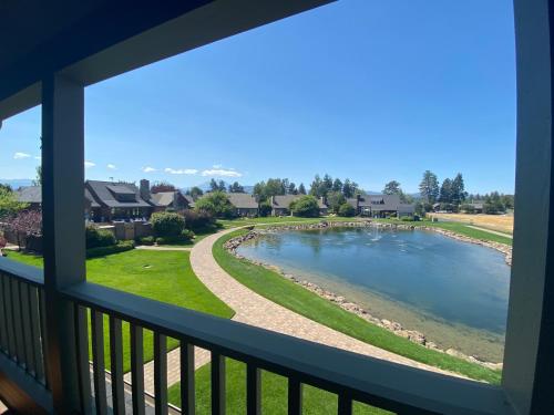 a view of a pool from a balcony at Riley`s Mountain View in Sisters