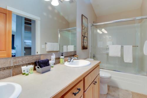 a bathroom with a sink and a shower and a toilet at Riley`s Mountain View in Sisters