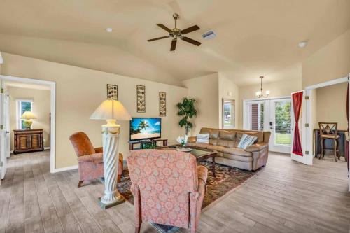 a living room with a couch and a table at Casa Dell'Amore in Murdock