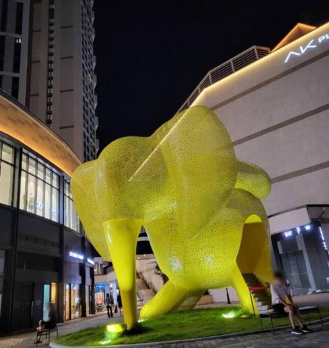 a yellow dog statue in front of a building at Geumjeong St1 Minute Seoul, Gangnam Transportation NICE in Gunpo