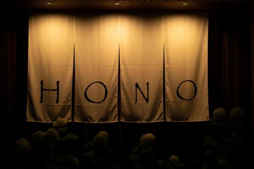 a curtain with the word truth written on it at Karuizawa Forest Seasons Villa in Karuizawa