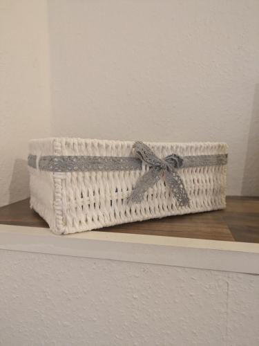 a basket sitting on top of a shelf at Gemütlicher Glücksplatz in Frielendorf