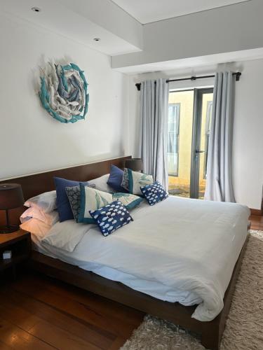 Ein Bett oder Betten in einem Zimmer der Unterkunft Villa Serenité