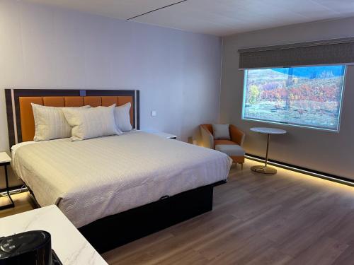Postel nebo postele na pokoji v ubytování Mountain View Motel