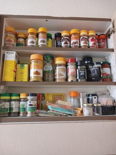 a pantry filled with lots of different types of food at Charmante Jugendstilwohnung mit Tiefengaragenplatz in St. Gallen