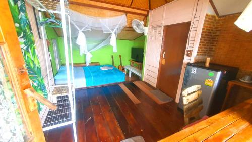 a room with a room with a bed in a room at Kohchang 7 seaview bungalow in Ko Chang