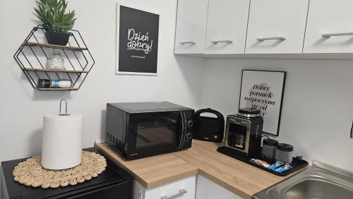 Η κουζίνα ή μικρή κουζίνα στο Apartament Diselvio