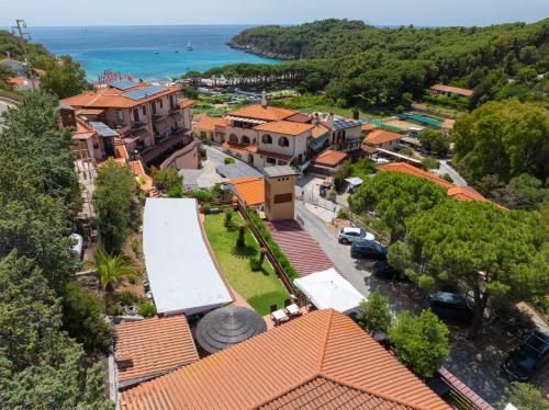 an aerial view of a town with orange roofs at Hotel Lo Scirocco in Campo nell'Elba