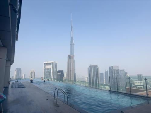 Escape24 Spacious 2BR Infinity Pool with Burj Views
