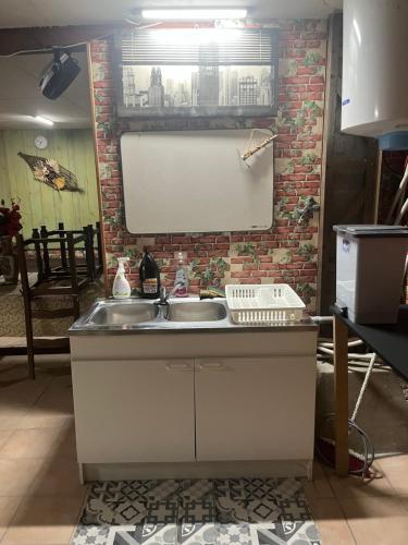 Kuchyň nebo kuchyňský kout v ubytování Maison dans une grange