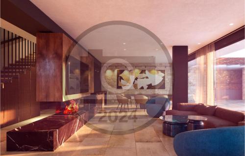 a living room with a couch and a fireplace at Villa Volpe Verde in Buje