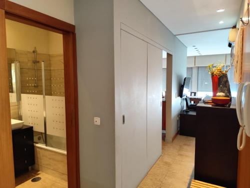 a hallway with a sliding glass door in a room at Perfect Sea View in Vila do Conde