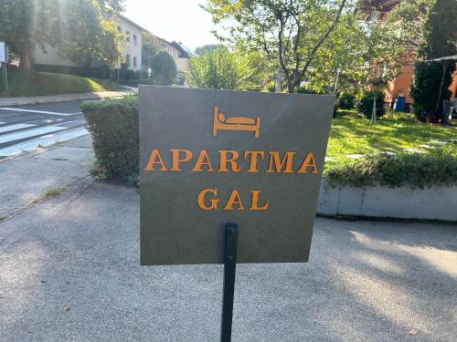 a sign that readsarma gel on a street at APARTMENT GAL in Novo Mesto