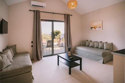 Χώρος καθιστικού στο Cape Blue Suites
