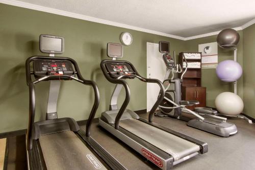 a gym with three exercise bikes in a room at Clarion Inn Asheville Airport in Fletcher