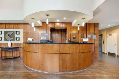 a lobby of a hospital with a reception counter at Comfort Suites East Lincoln - Mall Area in Lincoln